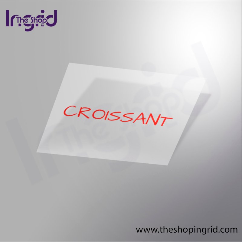 Vista de una pegatina decorativa del diseño tipográfico de la Palabra Croissant en color rojo.