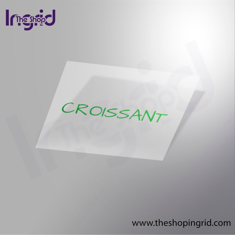 Vista de una pegatina decorativa del diseño tipográfico de la Palabra Croissant en color verde.